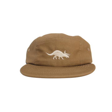 A beige five-panel cotton hat with an embroidered Triceratops silhouette on the front.